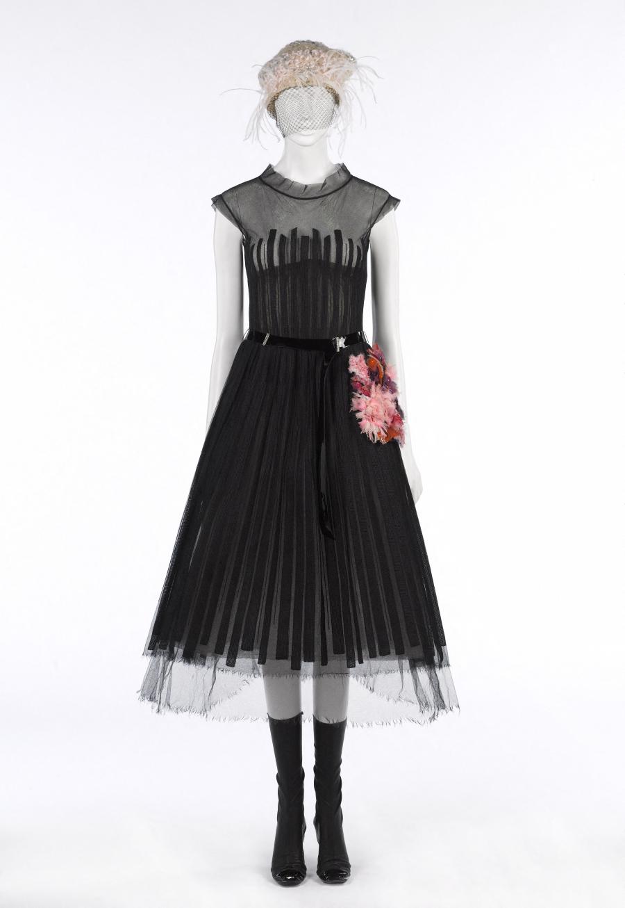Chanel Archive - 7 August 1936 Paris-Soir: Chanel evening dress in black  tulle. Bunch of pink roses trimming the bodice and hairstyle.